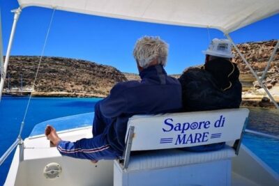 7 hours Boat trip to Lampedusa lunch, SUP and Snorkeling - First stop: the marine-reserve coastline and the beach you can admire from the water