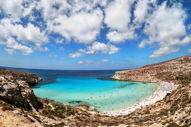7 hours Boat trip to Lampedusa lunch, SUP and Snorkeling - The return port stop: the Lampedusa migration monument