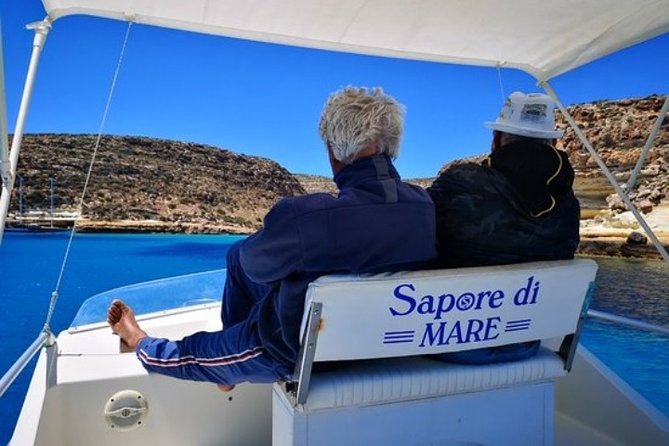 7 hours Boat trip to Lampedusa lunch, SUP and Snorkeling - First stop: the marine-reserve coastline and the beach you can admire from the water
