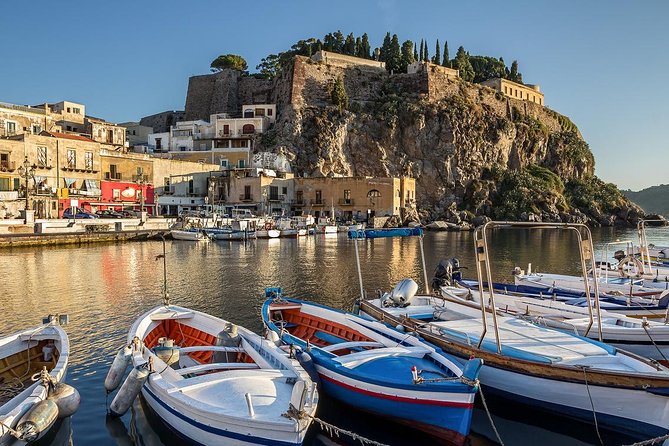 Aeolian Islands Day Trip from Taormina: Lipari and Vulcano - The return boat: photo stops past Faraglioni and Grotta del Cavallo