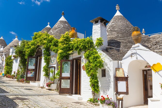 Alberobello, Monopoli Polignano Small Group Guided Tour from Bari - Polignano a Mare: cliff views, grottos energy, and the coffee move