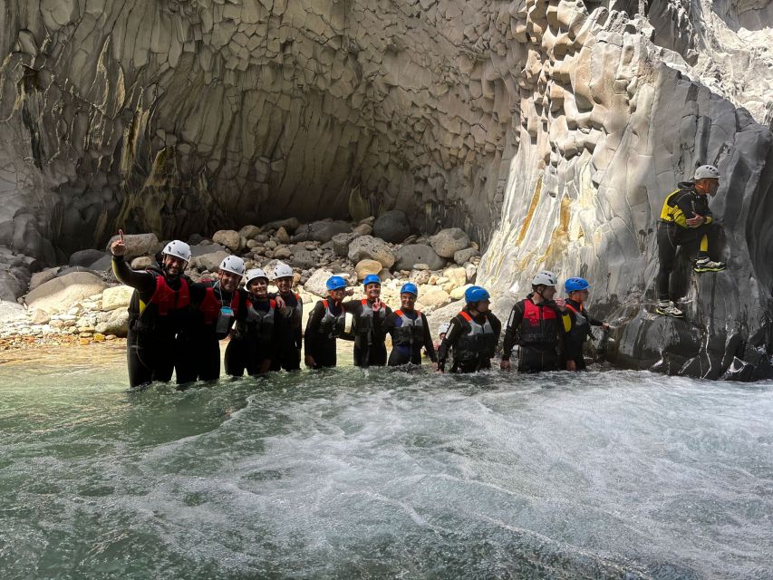 Alcantara River and Gorges: Bodyrafting Experience - The walk-in along the Alcantara: volcanic rock and guided positioning