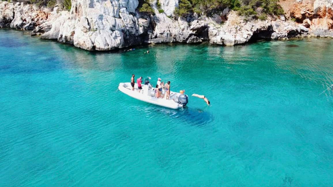 Alghero: Boat Tour with Snorkeling in Porto Conte - Meeting at Marina di Porto Conte and what the boat ride feels like