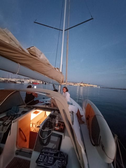 Alghero: Sunset Sailing Aperitif Experience - Leaving Alghero under sail: sightseeing with a safety briefing built in