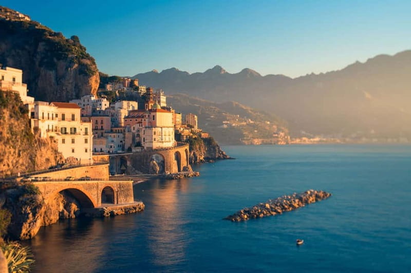 Amalfi: Sunset Boat Tour with Fruit and Drinks - The Arc of Lovers: A Natural Rock Arch With a Romantic Legend
