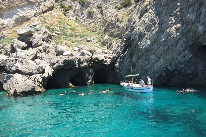 Amalfi to Capri Private Boat Tour - Lunch on the coast: shore time and the white wine and peaches idea