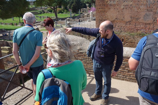 Ancient Ostia Antica Semi-Private Day Trip from Rome by Train with Guide - Decumanus Maximus, baths, and the amphitheater: the best parts to watch