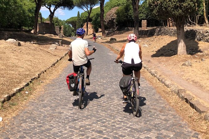 Appian Way E-bike Tour with Gourmet Picnic and Catacombs - Aurelian Walls Stop: Quick Warm-Up on Roman Stone