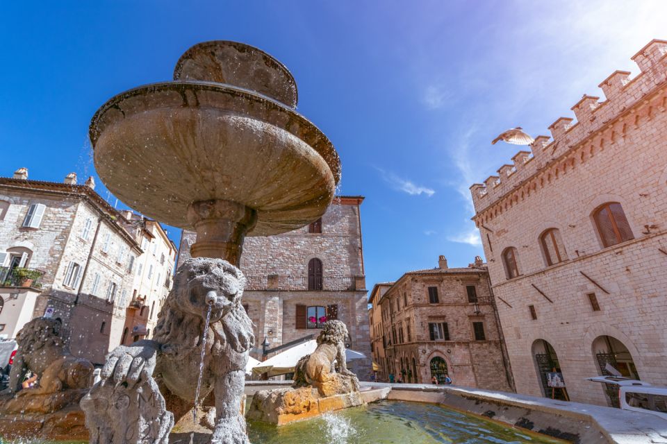 Assisi: Old Town Guided Walking Tour - Santa Maria sopra Minerva facade: the kind of detail worth stopping for