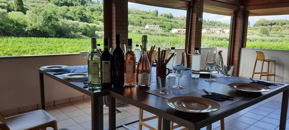 Bardolino: Vineyard Tour with Wine, Olive Oil & Food Tasting - Entering the Rocca del Garda: where this tour starts
