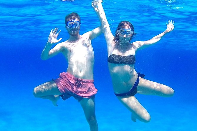 Boat Tour Egadi Day discover Favignana and Levanzo from Trapani - Favignana Port and the Old Tonnara Area: Walking Time Instead of Only Water Time