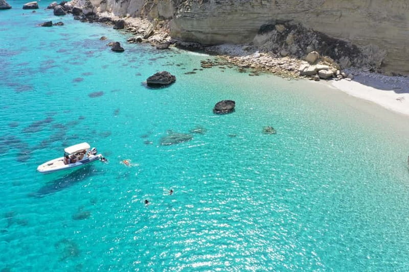Cagliari: Boat Tour, 4 Stops, Swim, Snorkeling, & 1 Spritz - Onboard Vibe: Music, Microphone, Bluetooth, and a Pink Drink