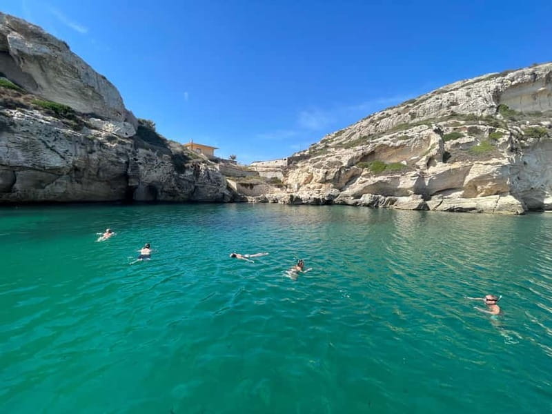 Cagliari: Boat Tour with 4 Swim Stops, Snorkeling & Prosecco - Snorkeling gear, sea life, and how to get better views fast