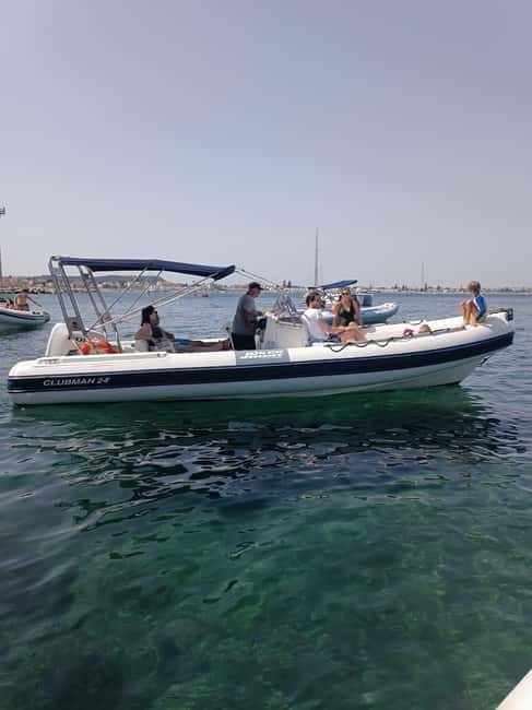 Cagliari: Devil's saddle boat tour, 4 stops and prosecco - Spiaggia Calamosca: Swimming time with a different coastline feel