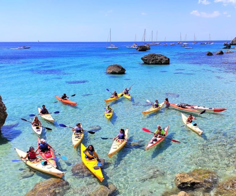 Cagliari: Guided Kayak Excursion in the Gulf of Cagliari - Calamosca beach stop: bathrooms, snack bar, and a breather before the return