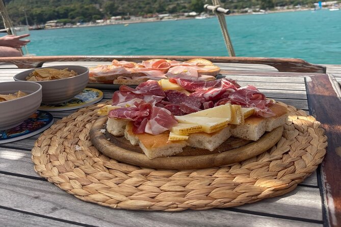 Cagliari Gulf Boat tour : 5 stops, snorkeling & local aperitif - The aperitif that turns a boat ride into a Sardinia moment