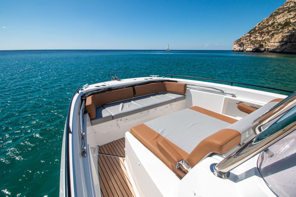 Cagliari: Luxury Motorboat Tour with 3 Swim Stops & Wine - What to bring so you enjoy every minute
