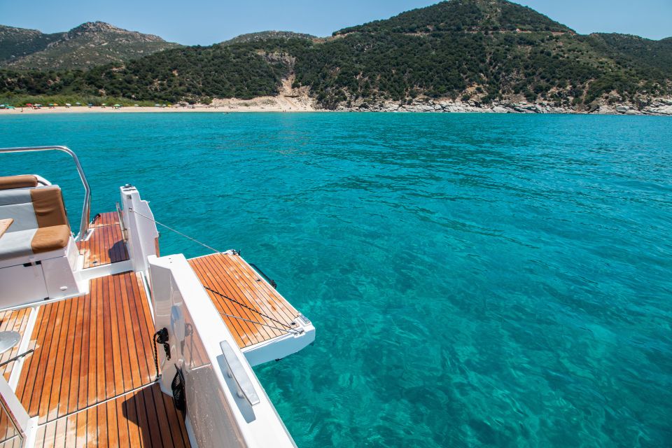 Cagliari: Luxury Motorboat Tour with 3 Swim Stops & Wine - Cala Mosca and Cala Fighera: where the swim stops turn into the main event