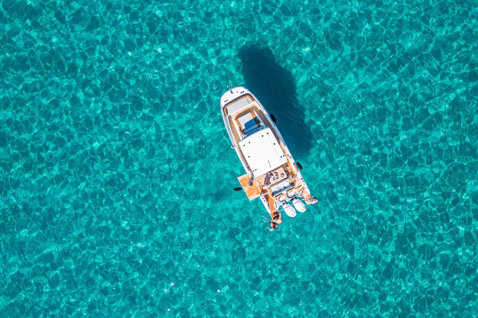 Cagliari: Luxury Motorboat Tour with 3 Swim Stops & Wine - Timing and sea conditions: morning is easier, afternoons can bring wind