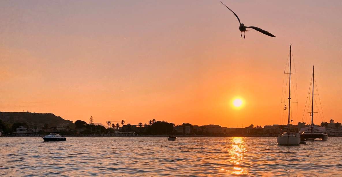 Cagliari: Sunset Boat Tour with Aperitif and Prosecco - First stop: Sella del Diavolo swimming and snorkeling