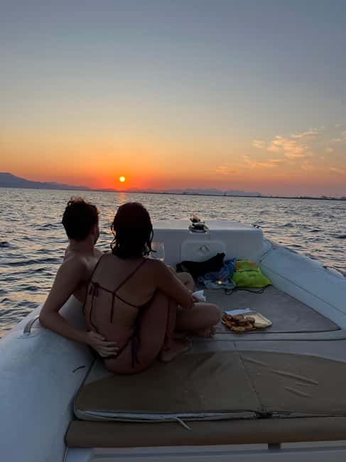 Cagliari: Sunset Boat Tour with Aperitif and Prosecco - Drinks, snacks, and the on-deck music vibe