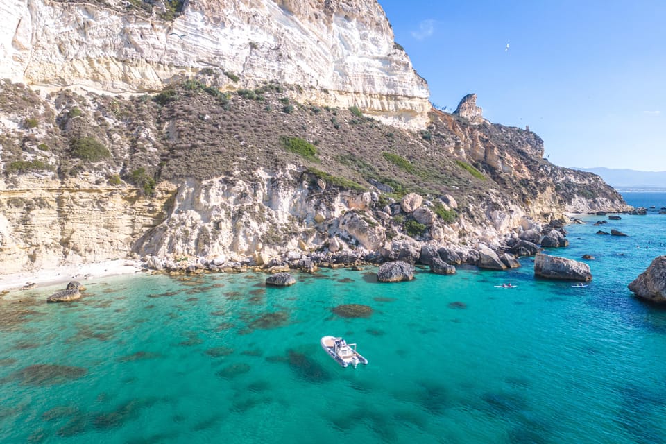 Cagliari: Zodiac Boat Tour, 3-4 SwimStops, Wine & Snorkeling - Wine on deck: a small add-on that changes the mood