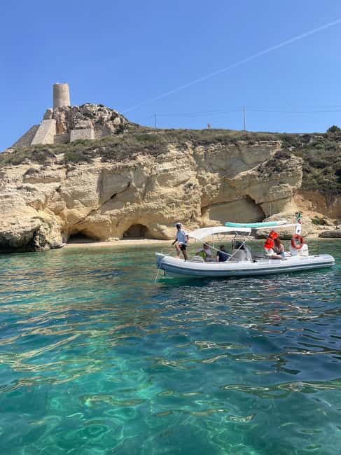 Cagliari:devil's saddle big cruise by boat drink & snack - The Swim and Snorkel Plan: Five Caves, Multiple Jumps In, and Fish Feeding