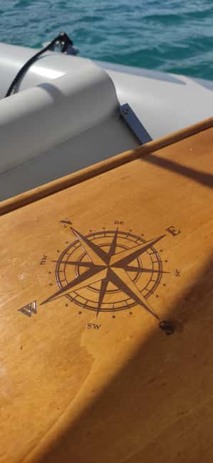 Cagliari:devil's saddle big cruise by boat drink & snack - Capitan Valter: The Host Who Turns Stops Into Stories