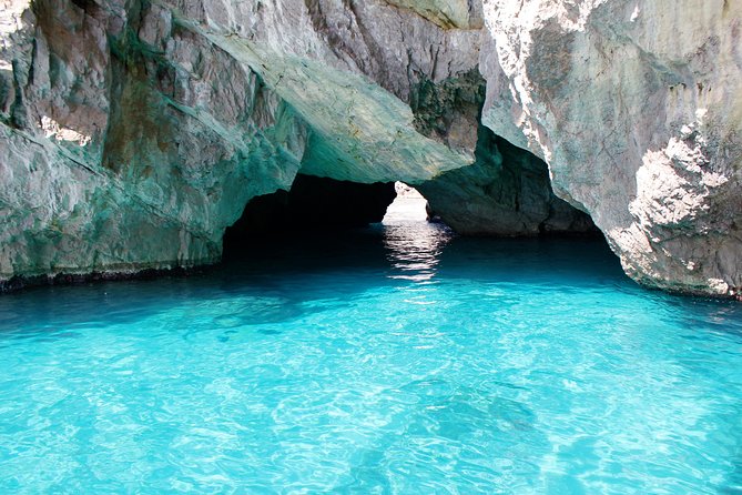 Capri Boat tour from Positano with Light Lunch, Drinks & Swim - Villa Malaparte, sea stacks, Punta Carena, and the Natural Arch