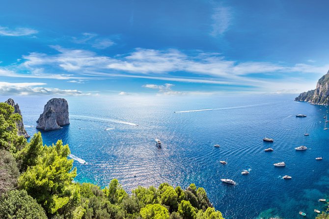 Capri Boat Tour from Sorrento: Swim, Grottos & Light Lunch - Faraglioni, Villa Malaparte, and Punta Carena: the postcard trio