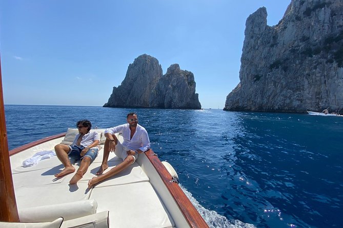 Capri Boat Tour: Grottoes, Swim & Sip Limoncello in a Small Group - Natural Arch, Malaparte’s Villa, and Punta Carena