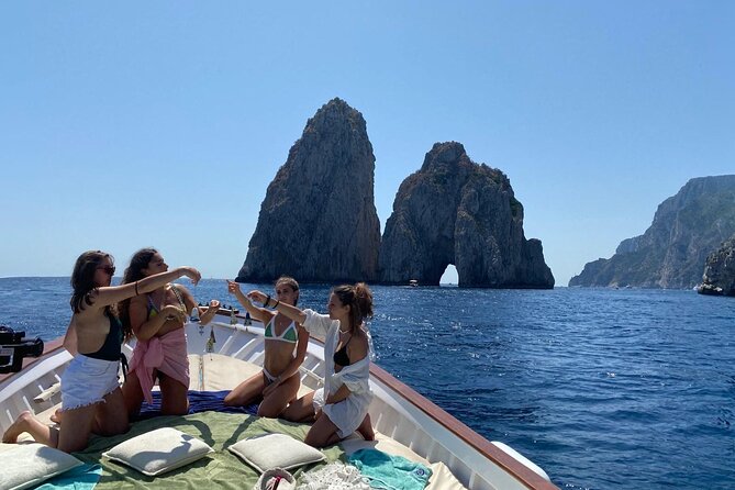 Capri Boat Tour: Grottoes, Swim & Sip Limoncello in a Small Group - Grotto Circuit: Marvellous, White, and Green Grotto Stops