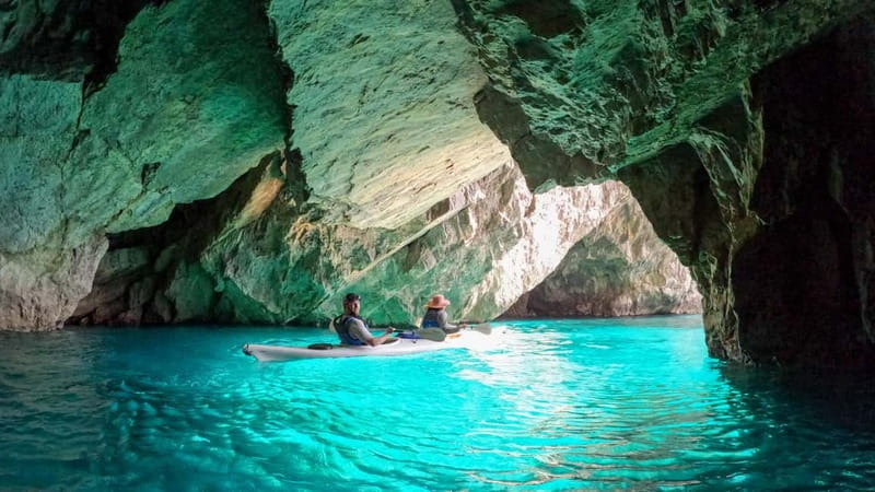 Capri: Caves and Beaches Kayaking Tour with GoPro Photos - Faraglioni photo stop: where the GoPro photos pay off