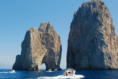 Capri Deluxe/First to Blue Grotto/from Sorrento Positano & Amalfi - Faraglioni and the Arch of Love: the stop for the iconic Capri picture