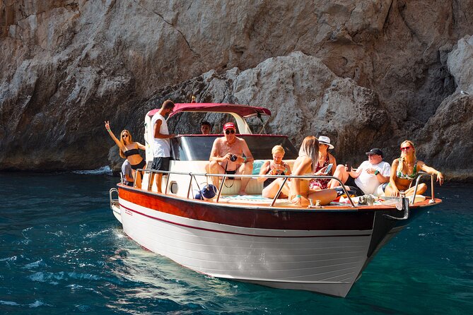 Capri Guided Boat Experience with Island Exploration and Transfer - Grotto time and swimming stops: the “conditions” part you should plan for