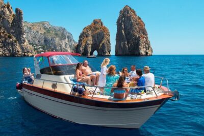 Capri Guided Boat Experience with Island Exploration and Transfer - Punta Carena lighthouse and the southwest approach: early big views