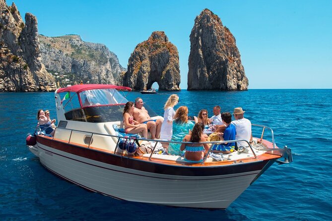 Capri Guided Boat Experience with Island Exploration and Transfer - Punta Carena lighthouse and the southwest approach: early big views