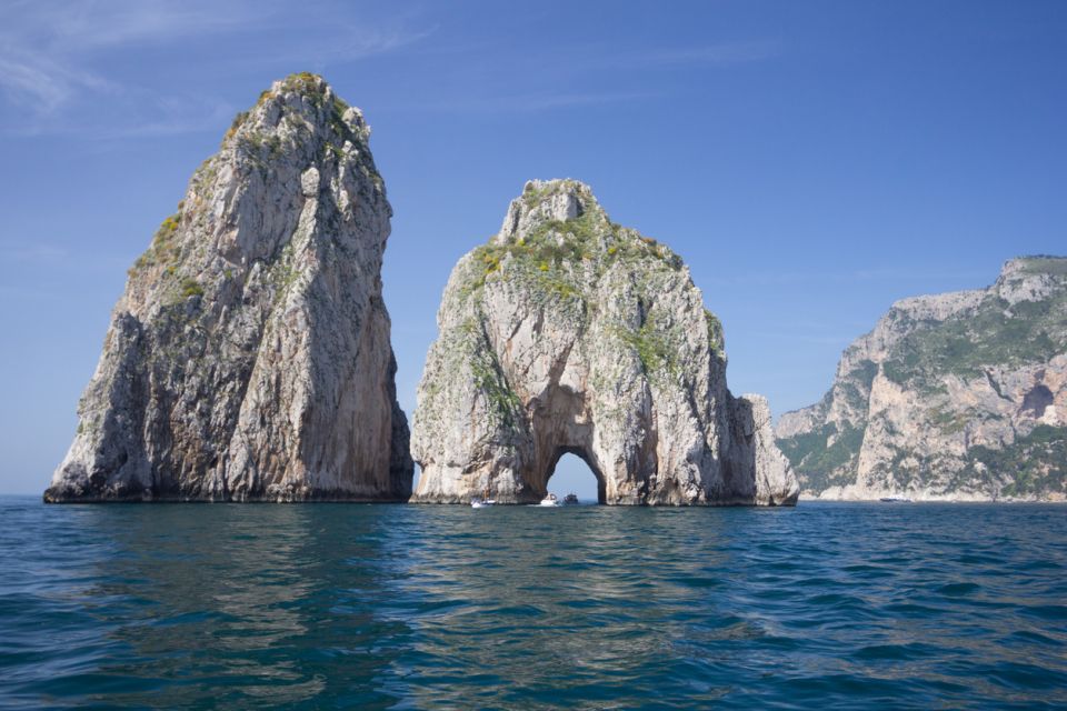 Capri: Island Sightseeing Tour with Blue Grotto Stop - Faraglioni, the Natural Arch, and the Grotto Rocks From Close Water