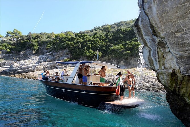 Capri Island Small Group Boat Tour from Naples with Light Lunch - Faraglioni, Malaparte from the sea, and Punta Carena lighthouse