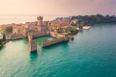Castles boat tour with Bardolino wine tasting and nibbles - Castles, Roman ruins, and a spa stop seen from the water