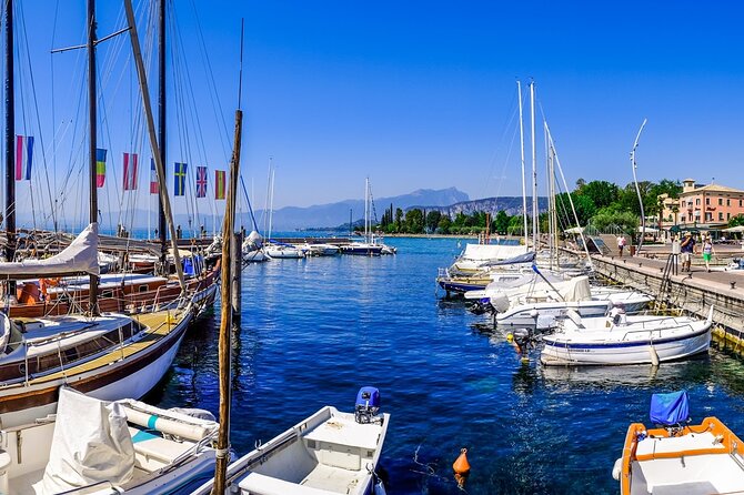 Castles boat tour with Bardolino wine tasting and nibbles - The Villa Canossa stop and the swim moment that refreshes everything
