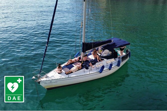 Catamaran tour stops bathing and snorkeling toast with prosecco - Cala Mosca and the “maybe swim” inlet that’s worth the stop-and-watch