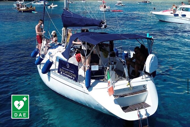 Catamaran tour stops bathing and snorkeling toast with prosecco - Grotta dei colombi: a cliffside ravine with a legend attached