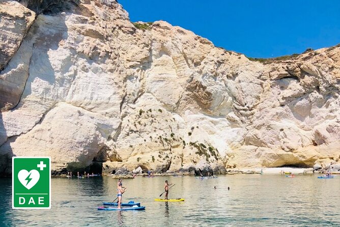 Catamaran tour stops bathing and snorkeling toast with prosecco - The Devil’s Saddle port view: Poetto begins in this big, breezy bay