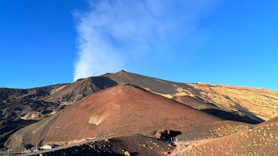 Catania: Etna Sunset Tour with Pickup and Drop-off - Grotta dei Tre Livelli: Torch-Lit Volcanic Cave Time
