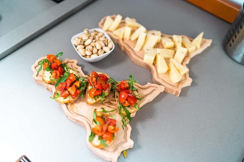 Catania: Sail Tour of Cyclops Coast with Sicilian Aperitif - The aperitif hour at Aci Trezza: Prosecco and Sicilian snacks without rushing