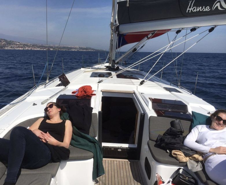 Catania: Spritz and Sunset Sailing Tour - Aperitif Hour in Aci Trezza: Drinks, Local Snacks, and a Real Break