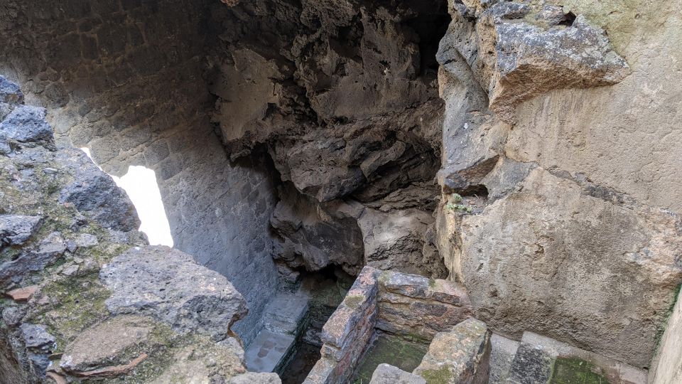 Catania: Underground Catania Tickets and Guided Tour - Following the Amenano Underground River Into a Cave