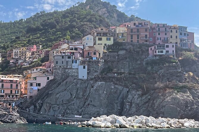 Catch the Sun, Skip the Crowds: 5Terre w Aperitivo&Snorkel - Riomaggiore: Steep, Intimate, and Close-Up From the Water