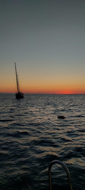 Cefalù: Mini Yacht with Snorkel Stops, Caves and Aperitif - Mazzaforno Beach: first swim and snorkel stop with gear already handled